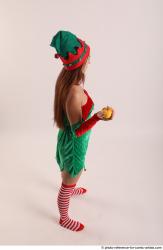 Veronika Elf Pose With Apple